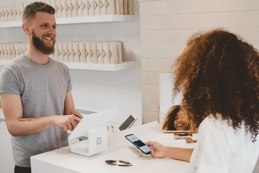Person reviewing mobile phone bill and payment