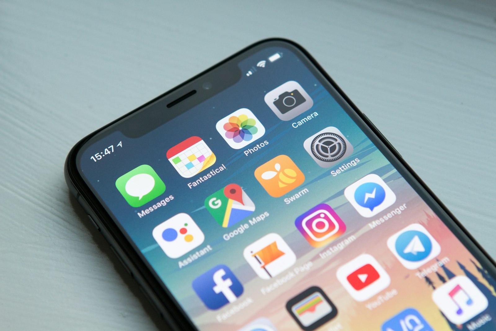 iPhone in hand for mobile data settings